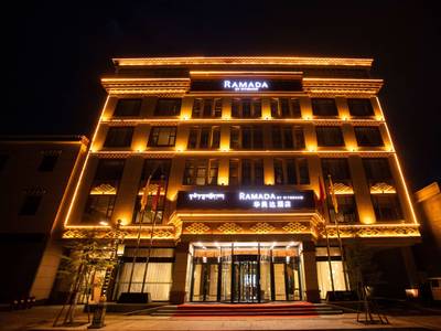 Ramada By Wyndham Diqing - Bild 1