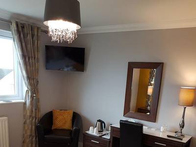 Bojangles Guest House - Bild 1