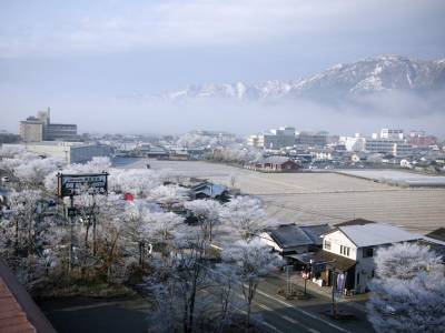 Aso Plaza Hotel - Bild 1