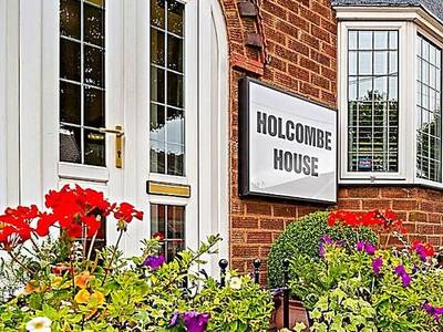 Holcombe House Aparthotel - Bild 1